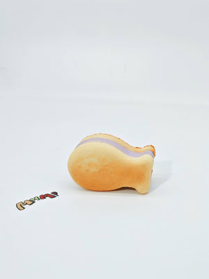 Purple Filling Fish Cake Squishy | Snack Themed Slow Rising Stres - slow rising squishy toy product photo