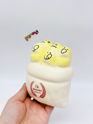 Cute Multi-Face Baguette Bread Stress Relief Squishy - slow rising squeeze toy side angle view