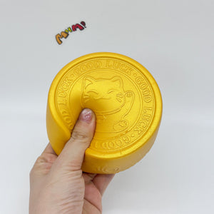 Kawaii Lucky Cat Gold Coin Squishy: Bring Home the Good Luck - slow rise fidget toy texture close up
