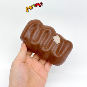 Slow Rise Chocolate Fried Dough Squishy - slow rising squeeze toy side angle view