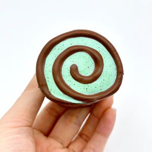 Mint Chocolate Roll Slow Rise Squishy Toy - squishy toy size reference with hand