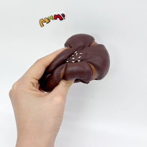 Cute Flower-Shaped Chestnut Pastry Stress Relief Squishy - squishy toy size reference with hand