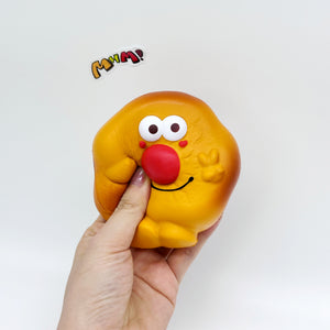 Kawaii Smiley Fried Egg Squishy - squishy toy size reference with hand