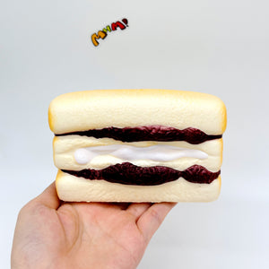 Purple Rice Bread Squishy | Cute Asian Snack Slow Rising Stress R - slow rising squeeze toy side angle view