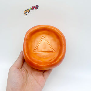 Caramel Dalgona Candy Squishy | Triangle Pattern Sugar Honeycomb - slow rising squeeze toy side angle view