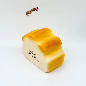 Milk Haas Bread Squishy - Chocolate Brown & Original Bread Yellow - kawaii squishy toy close up