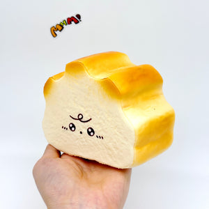 Milk Haas Bread Squishy - Chocolate Brown & Original Bread Yellow - soft foam stress relief squeeze toy