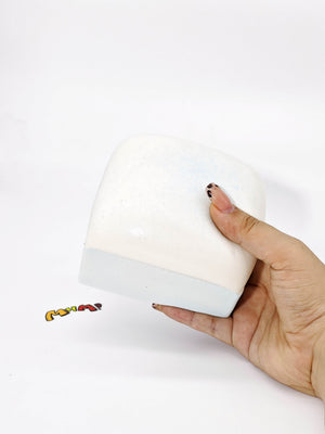 Sea Salt White Chocolate Cake - slow rising squeeze toy side angle view