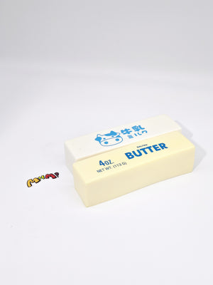 Butter & Milk Bars - squishy toy size reference with hand