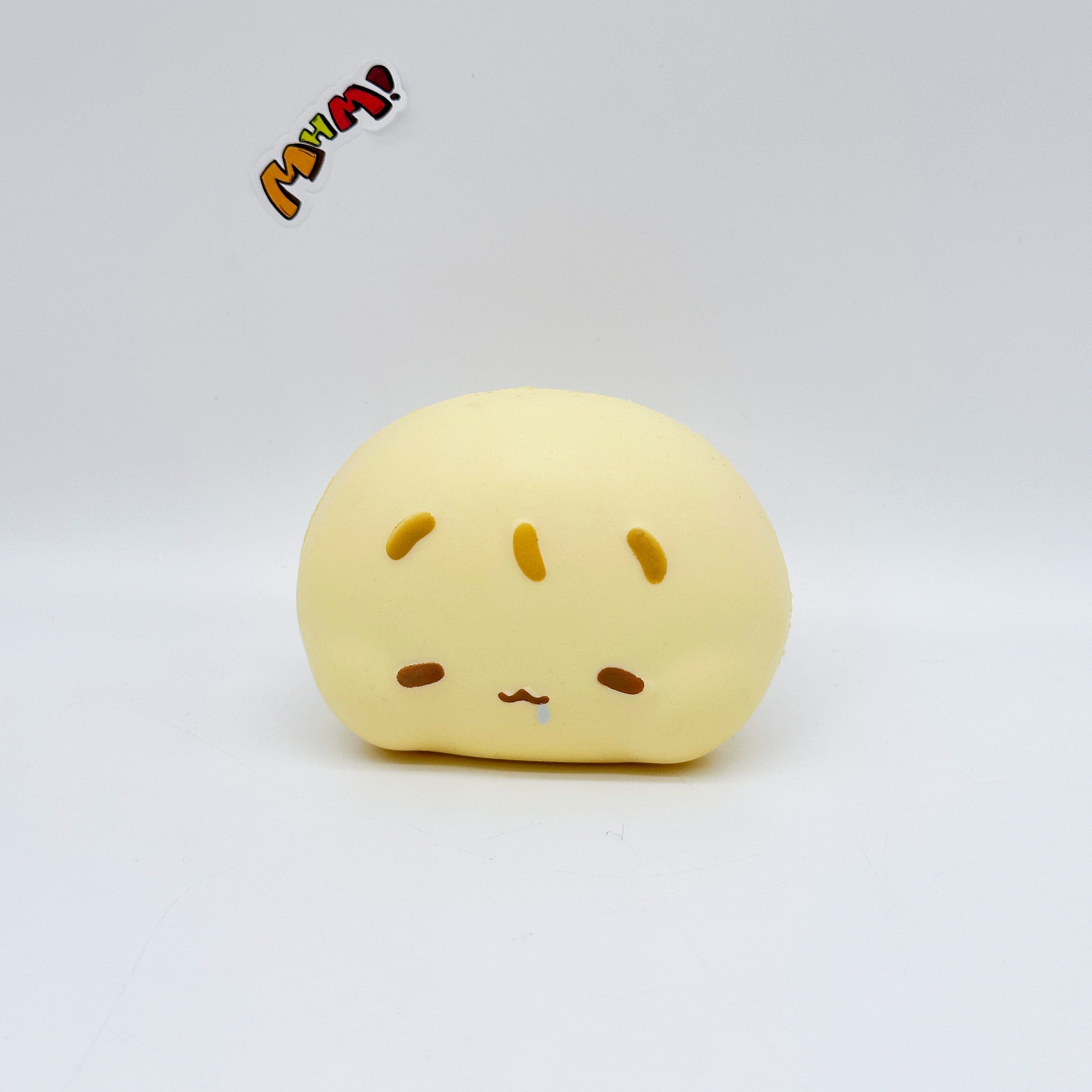 Cute Bao Bun Squishy Your New Kawaii Desk Buddy - slow rising squeeze toy side angle view