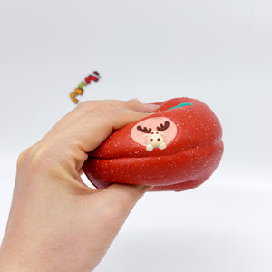 Slow Rise Apple Squishy with Cute Deer Squeeze Away Stress - slow rise fidget toy texture close up