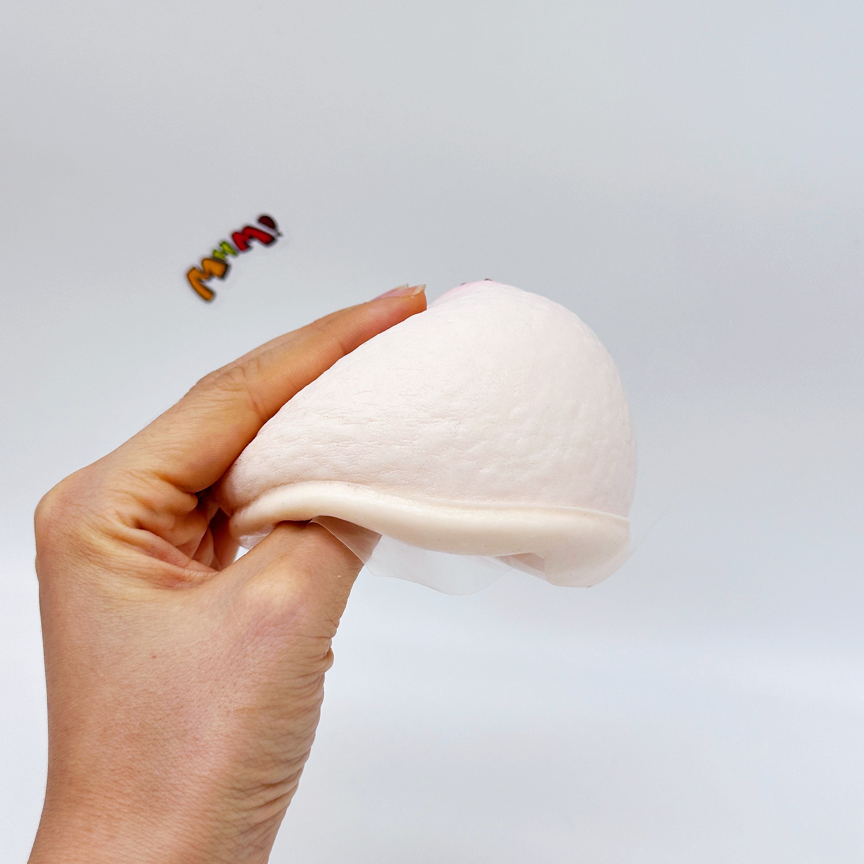 Kawaii Pink Mochi Slow Rise Squishy Toy - slow rise fidget toy texture close up