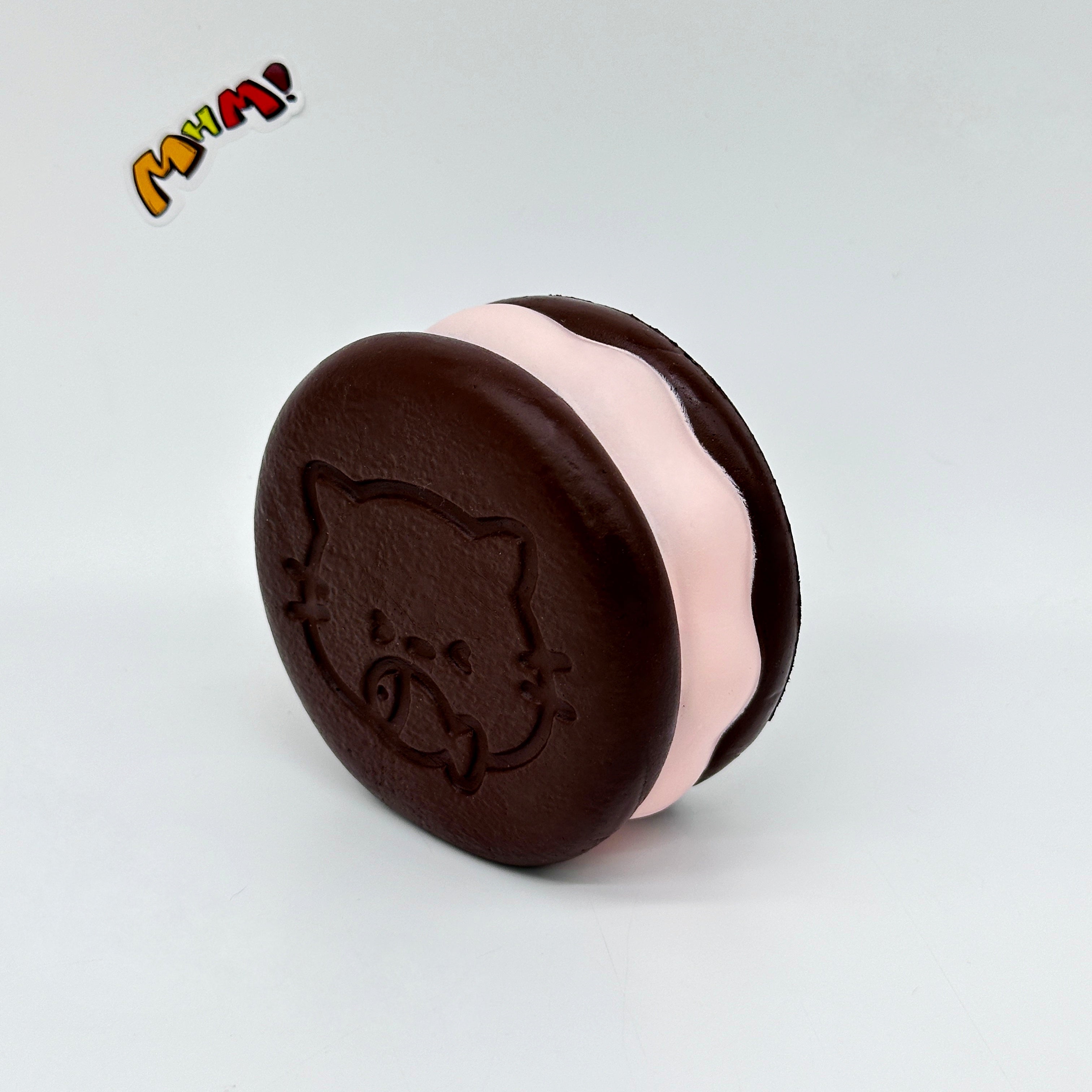 Kawaii Chocolate Cookie Squishy with Kitty Emboss: Ultra Soft & S - slow rising squeeze toy side angle view