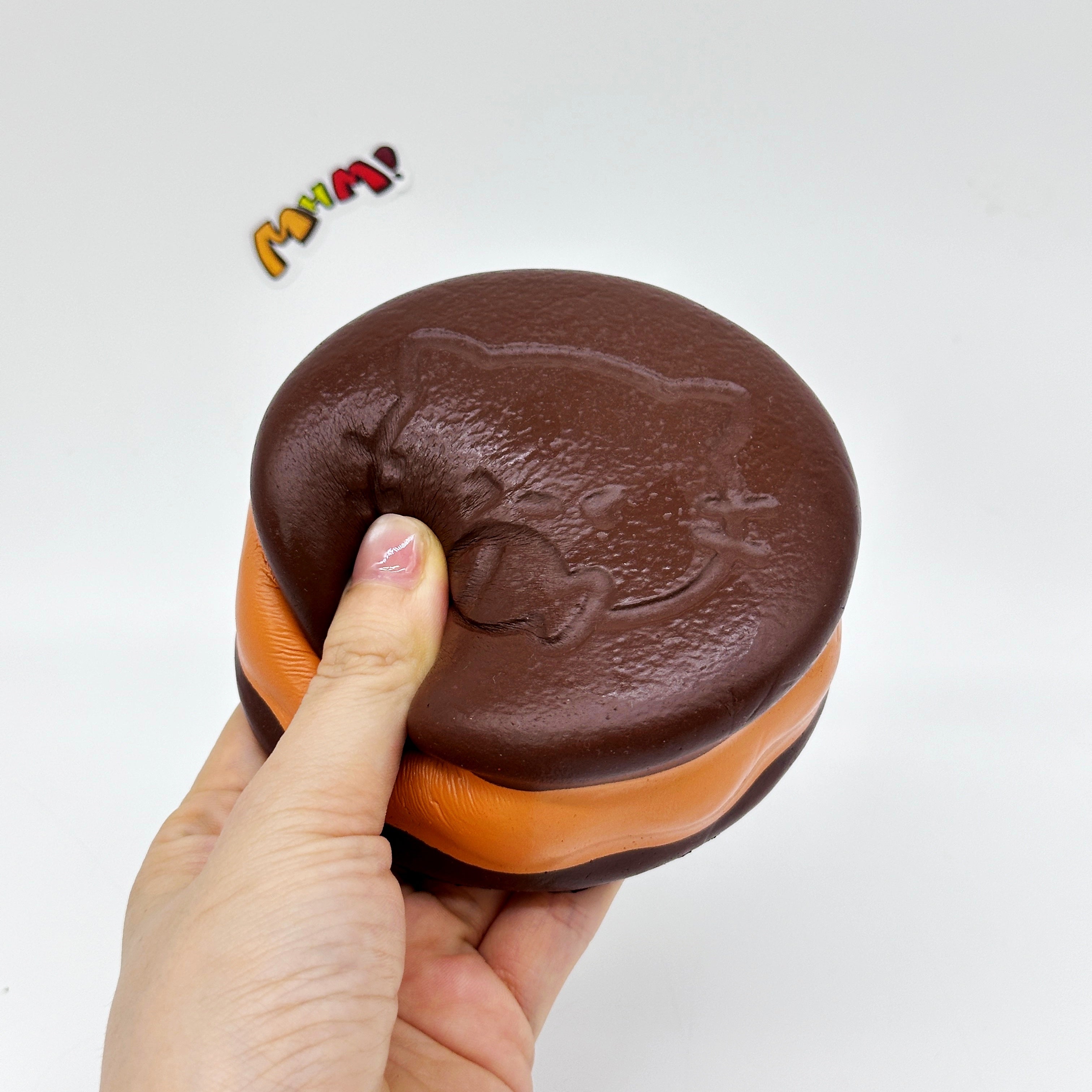 Kawaii Chocolate Cookie Squishy with Kitty Emboss: Ultra Soft & S - slow rise fidget toy texture close up