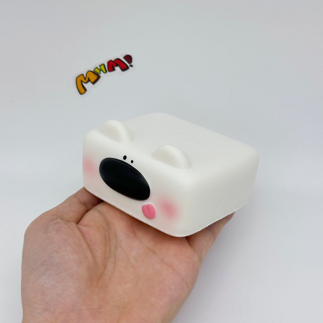 Kawaii Dog Squishy: Tofu Dog -- Controller -- Headphone Case! - slow rise fidget toy texture close up