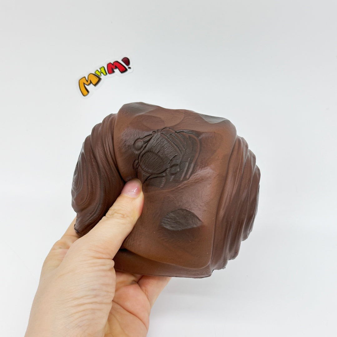 Cute Dirty Bun Slow Rise Squishy Toy - slow rising squeeze toy side angle view