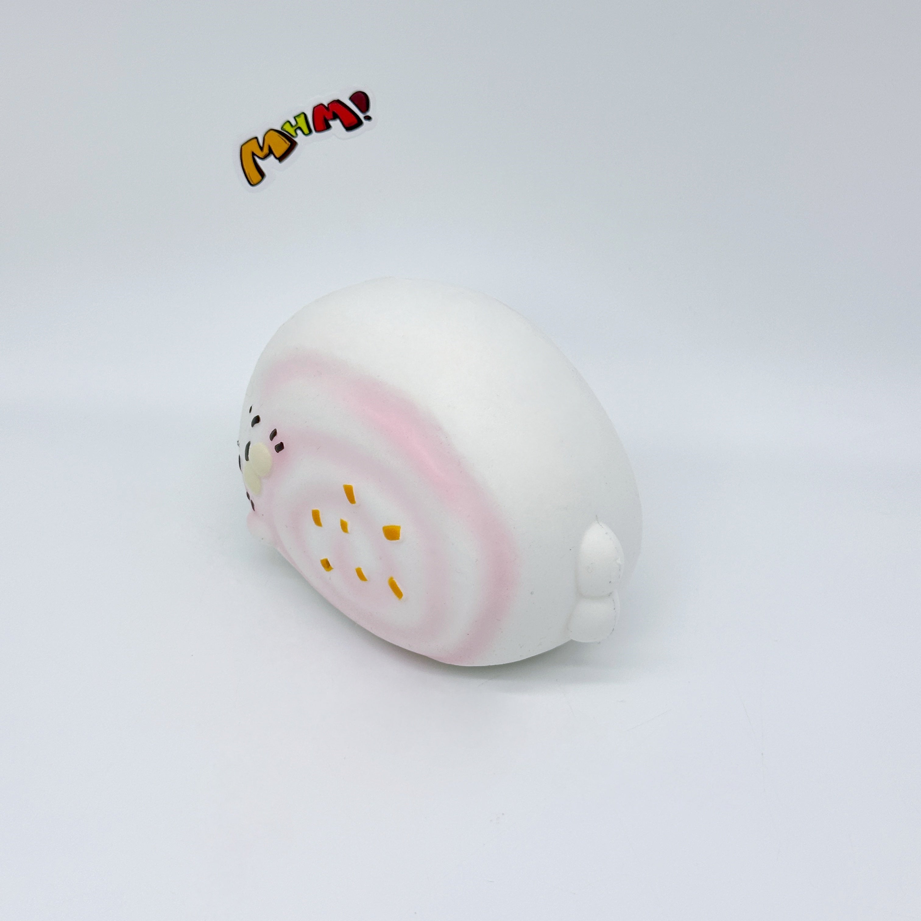 Sleepy Seal Squishy | Cute Pink Swirl Cream Slow Rising Stress Re - soft slow rise fidget toy front view