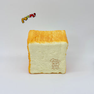 Thick Cut Toast Slow Rise Squishy Toy - slow rising squeeze toy side angle view