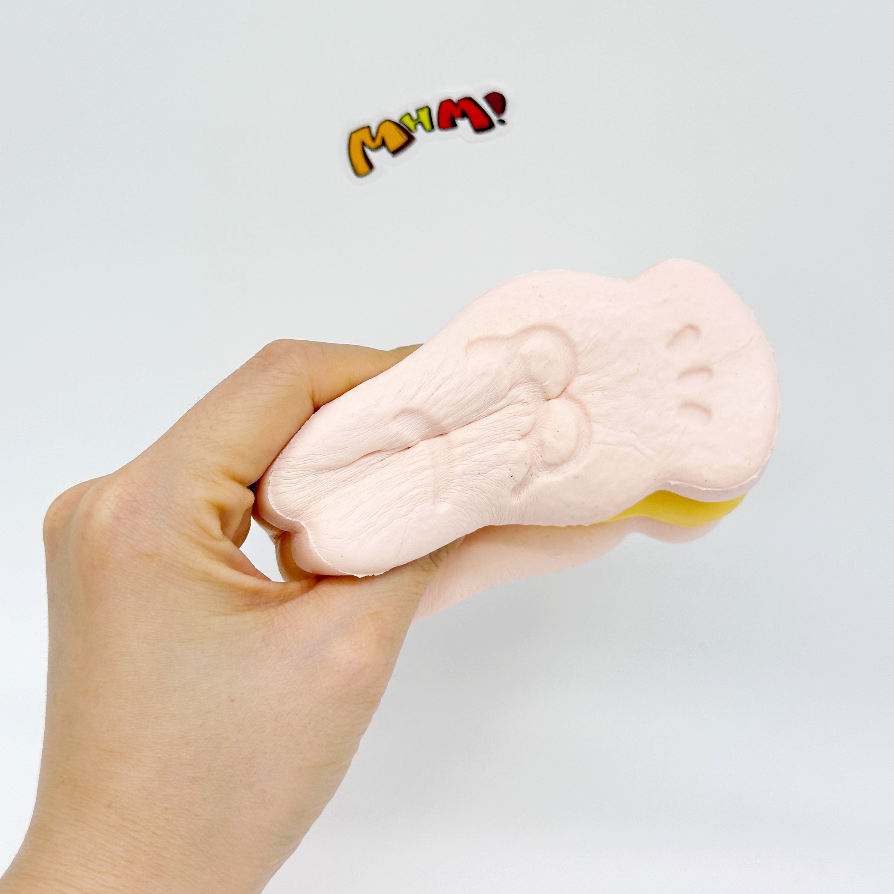 Taro/Strawberry Taiyaki Slow Rise Squishy Toy - squishy toy size reference with hand