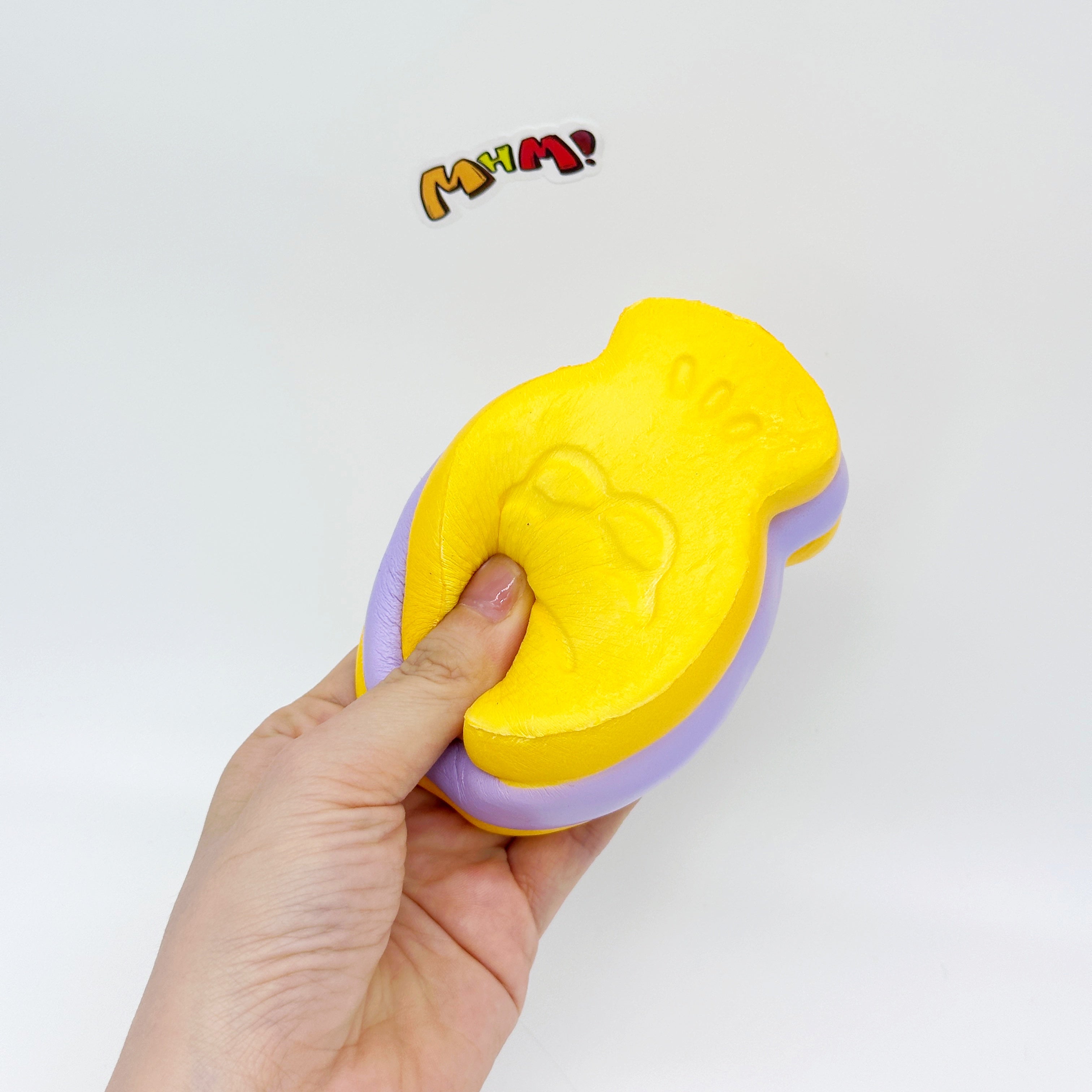 Taro/Strawberry Taiyaki Slow Rise Squishy Toy - slow rising squeeze toy side angle view