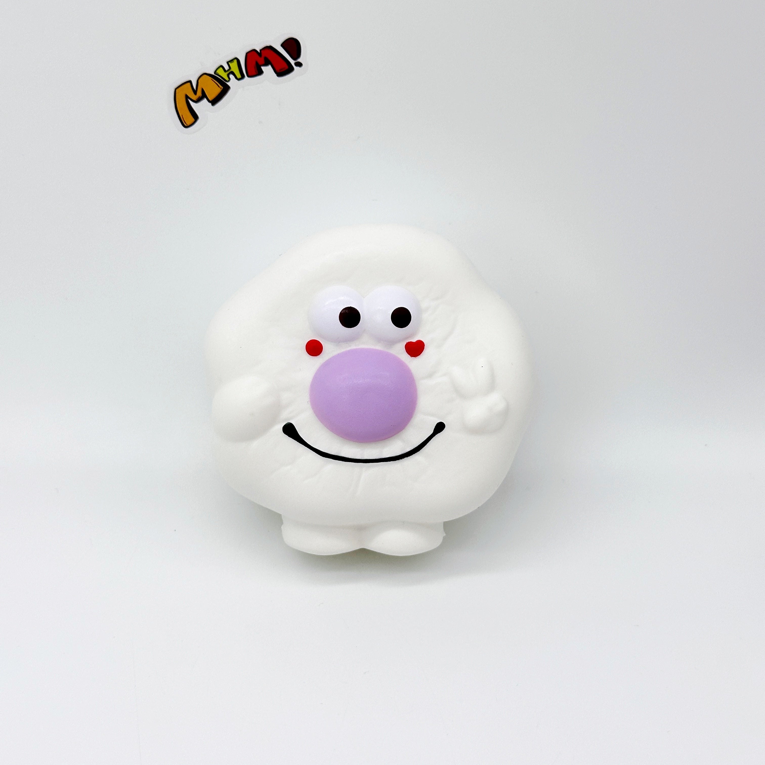Kawaii Smiley Fried Egg Squishy - slow rising squeeze toy side angle view