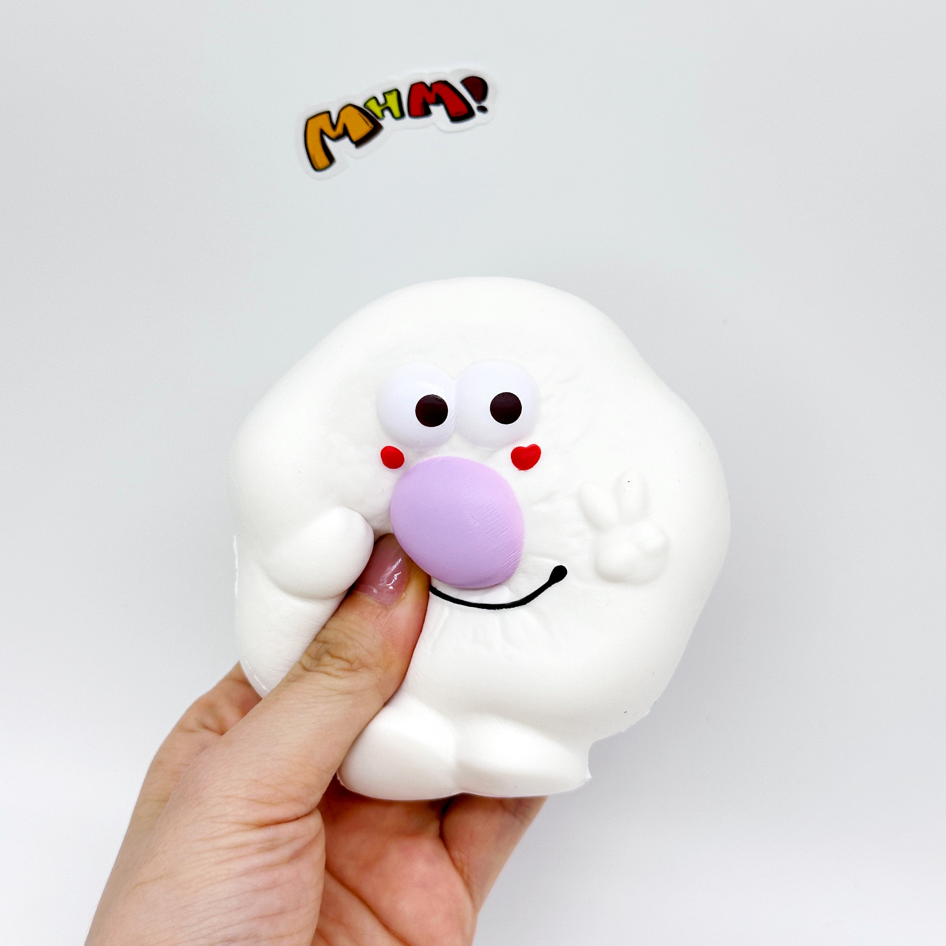 Kawaii Smiley Fried Egg Squishy - slow rise fidget toy texture close up