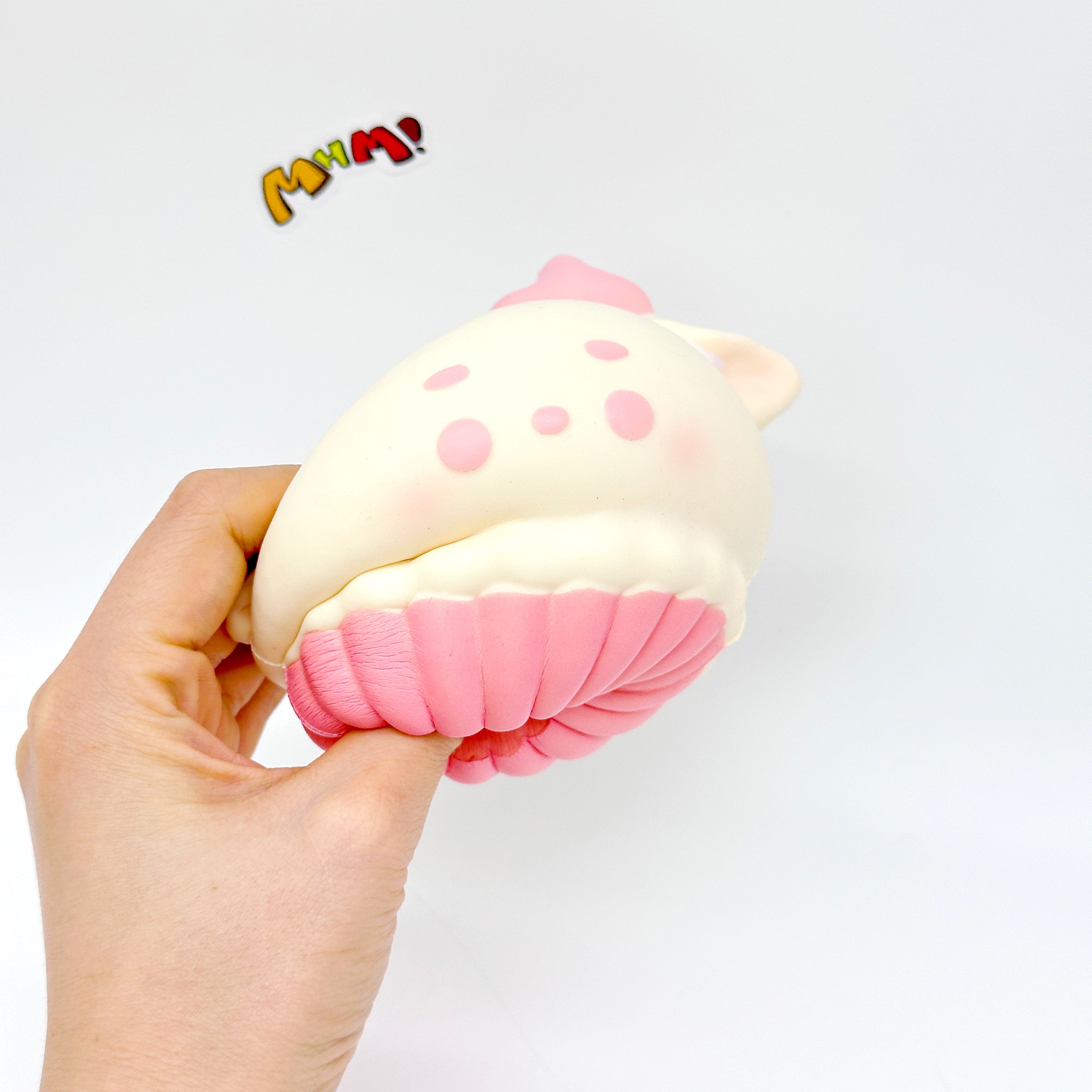 Sweet Reindeer Cupcake Squeeze Toy - squishy toy size reference with hand