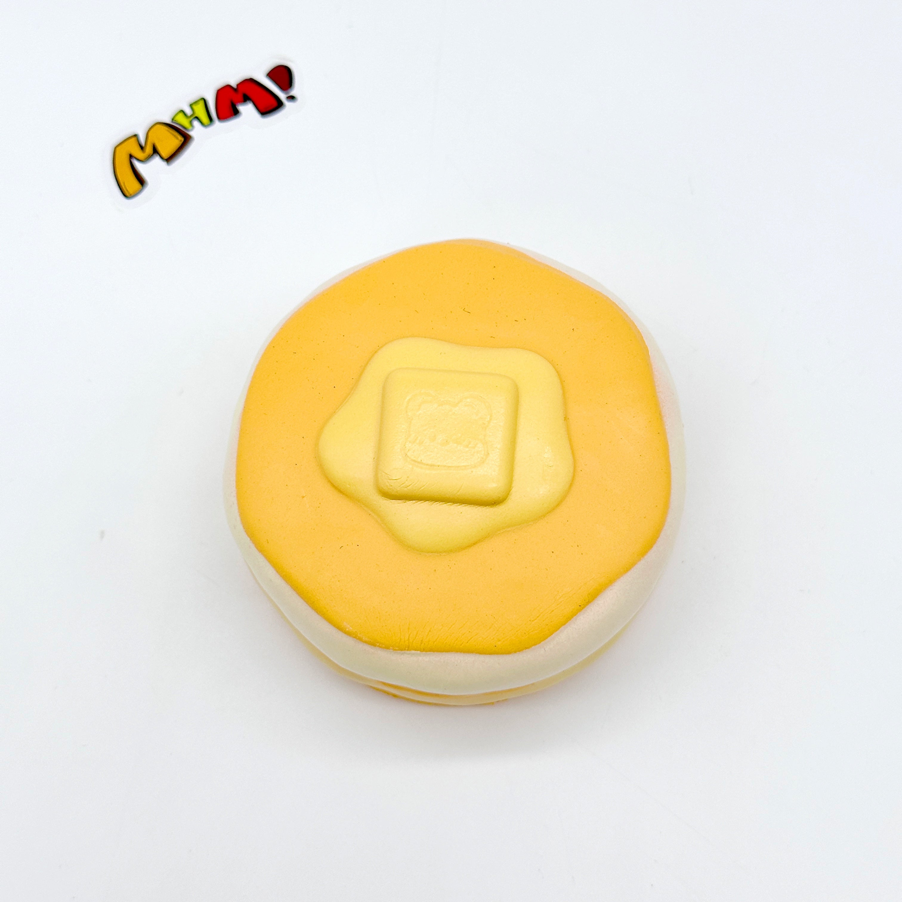 Top view honey bread squishy toy with melting butter detail, soft foam pancake squeeze sensory toy