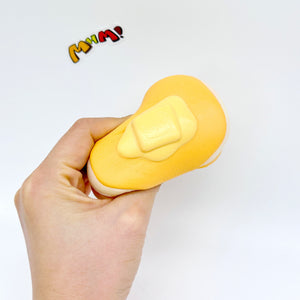 Hand squeezing soft honey bread squishy stress relief toy