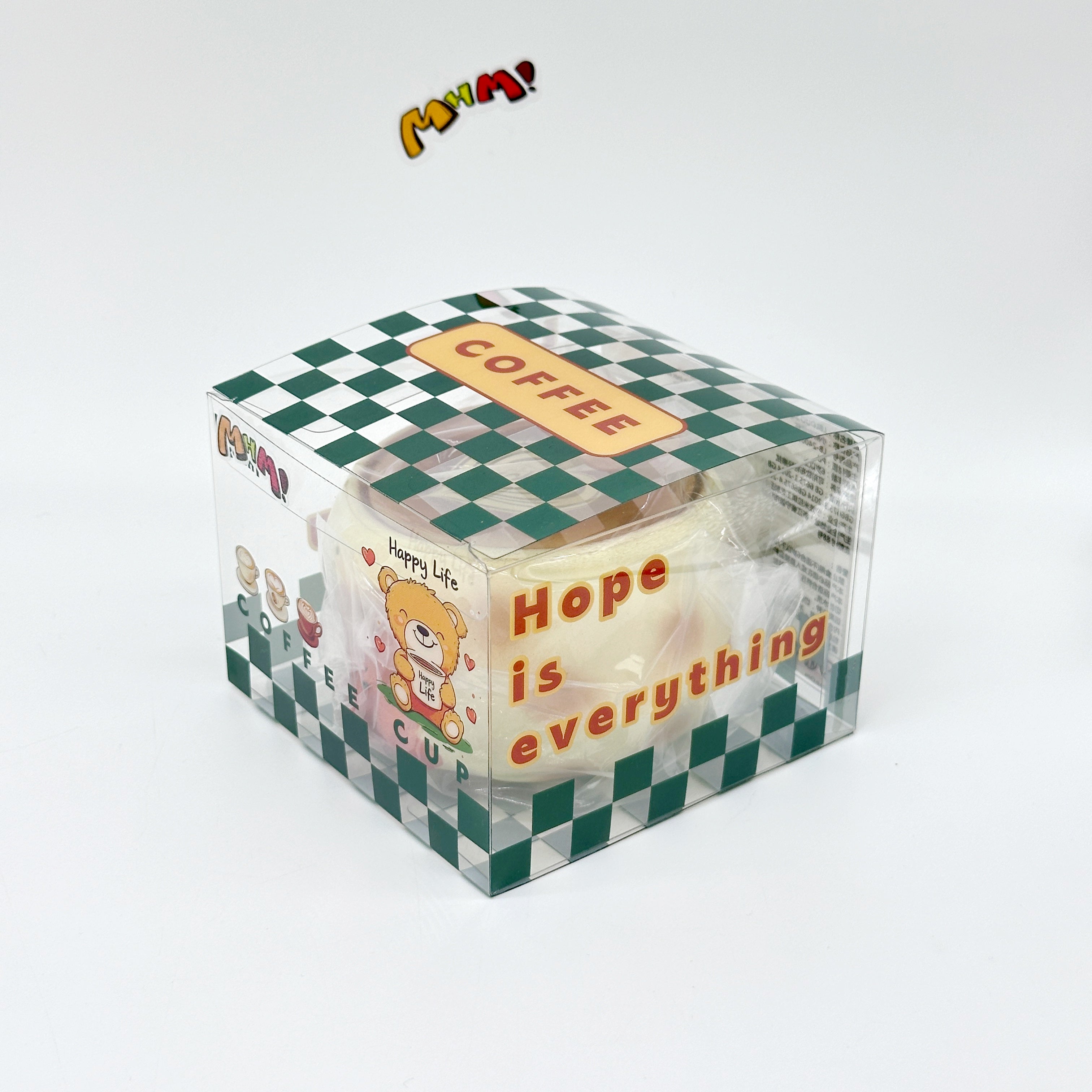 Animal coffee cup squeeze toy in green checkered clear gift box packaging