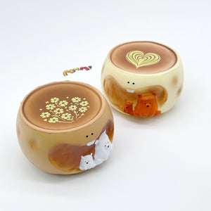 Two bear coffee cup squeeze toys with latte art tops and 3D bear figurines