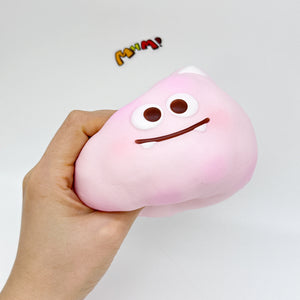 Cute little monster cotton candy, stress-relieving toy squishy - kawaii squishy toy close up