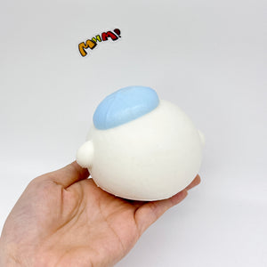 Blue Beret Dazed Ball Squishy Slow-Rise - slow rising squeeze toy side angle view