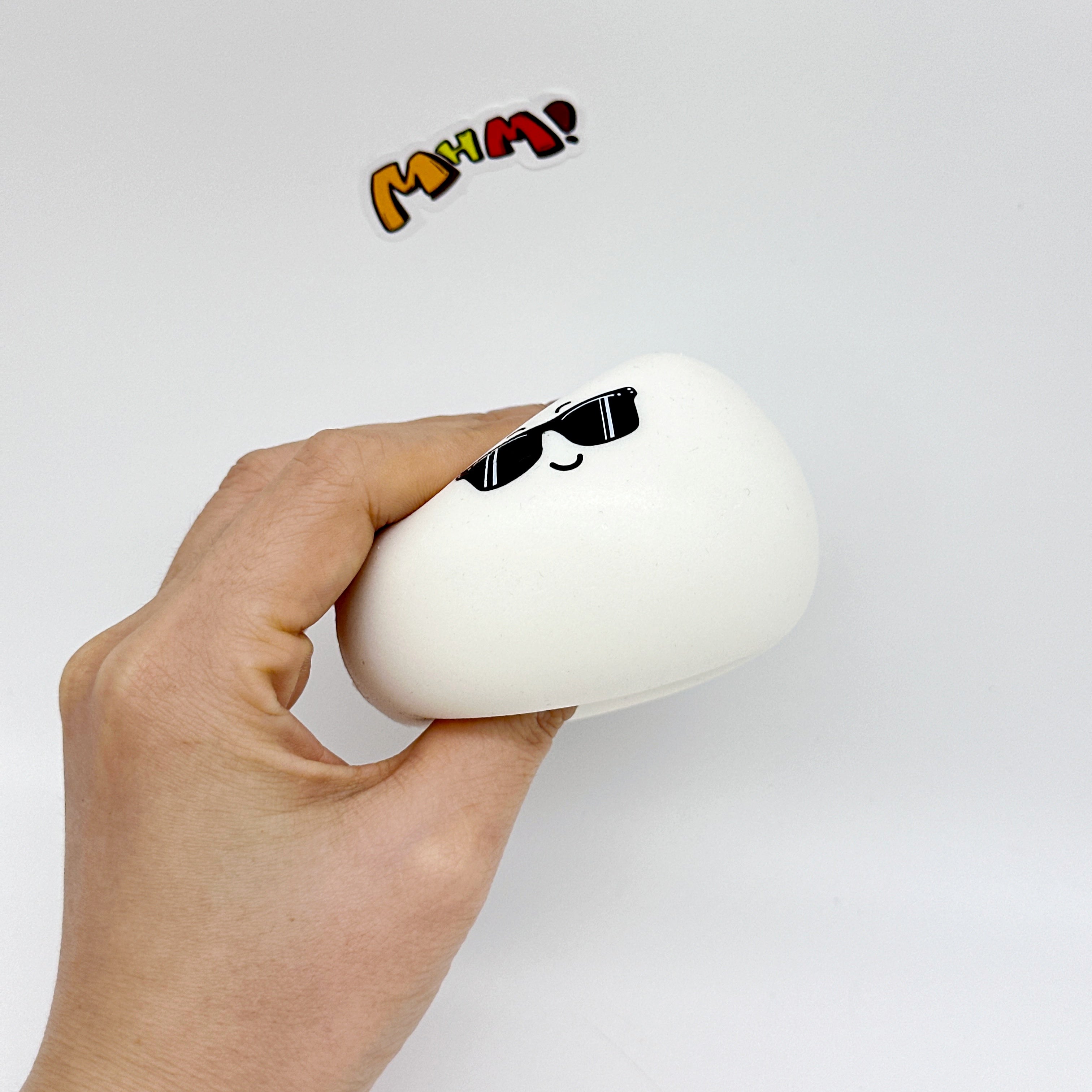 Boiled eggs and raw eggs, gently squish and have fun! - squishy toy size reference with hand