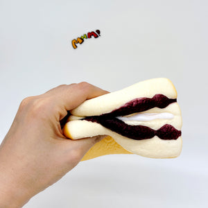 Purple Rice Bread Squishy | Cute Asian Snack Slow Rising Stress R - squishy toy size reference with hand