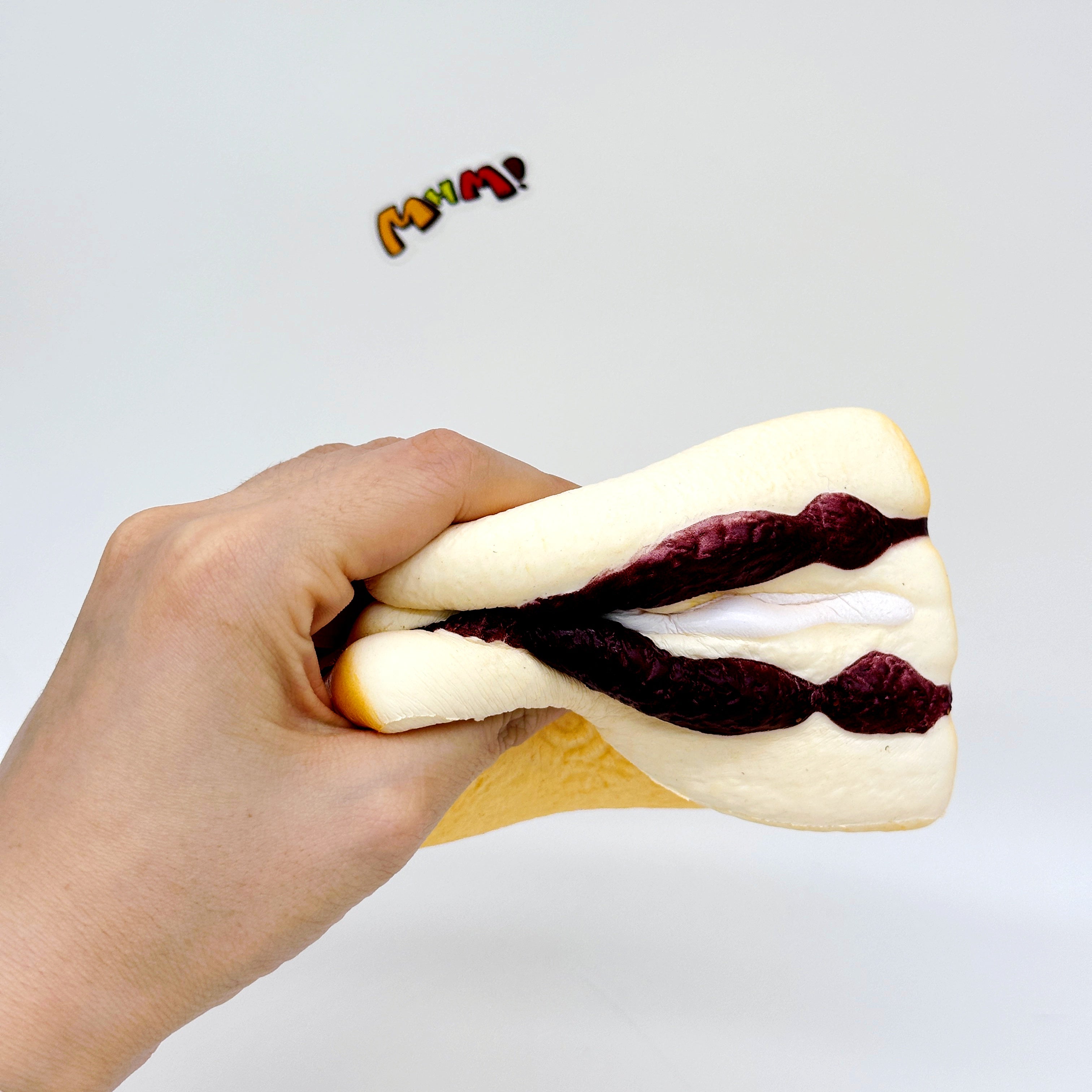 Purple Rice Bread Squishy | Cute Asian Snack Slow Rising Stress R - squishy toy size reference with hand