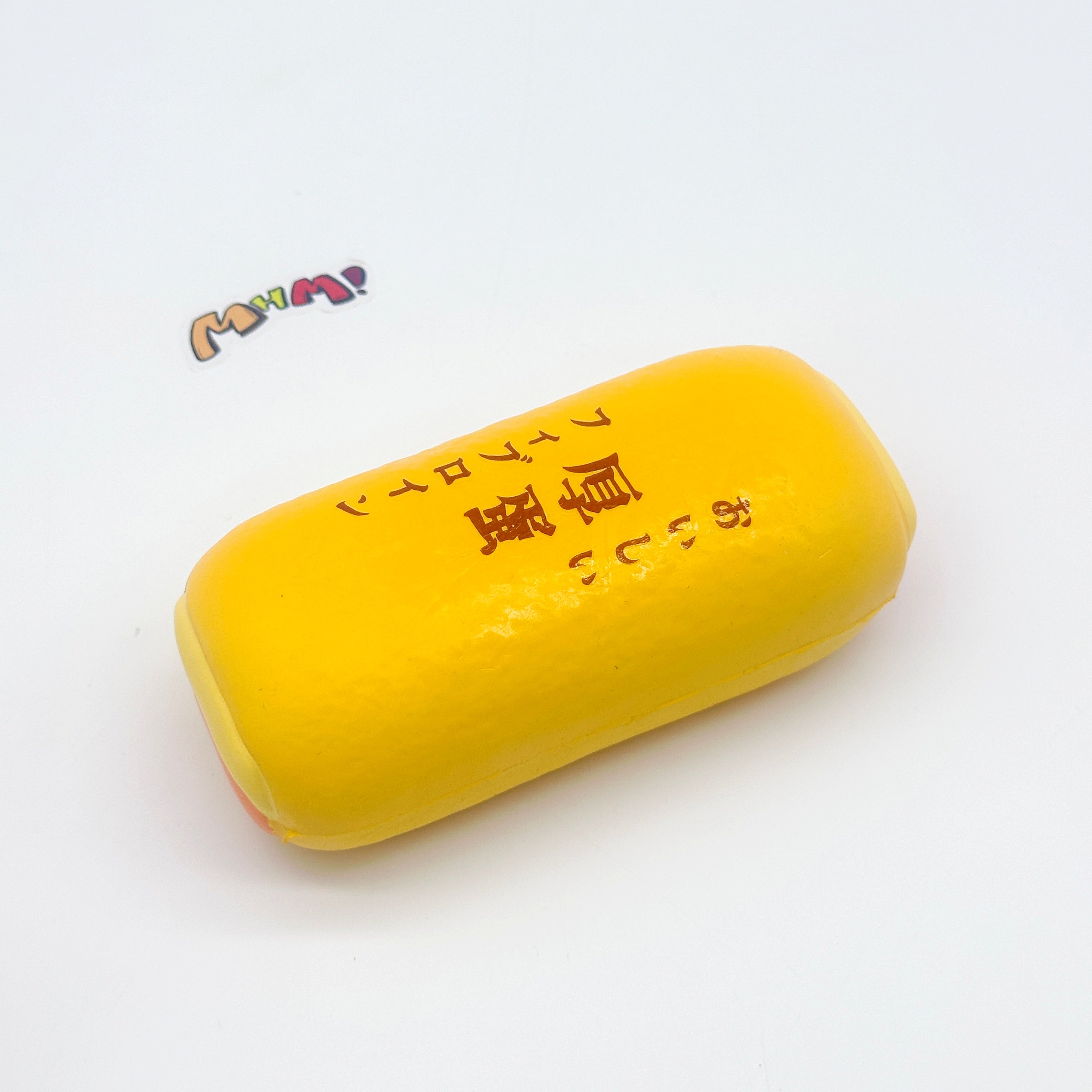 Tamagoyaki Squishy - Yellow & Chocolate Japanese Thick Egg Omelet - kawaii squishy toy close up