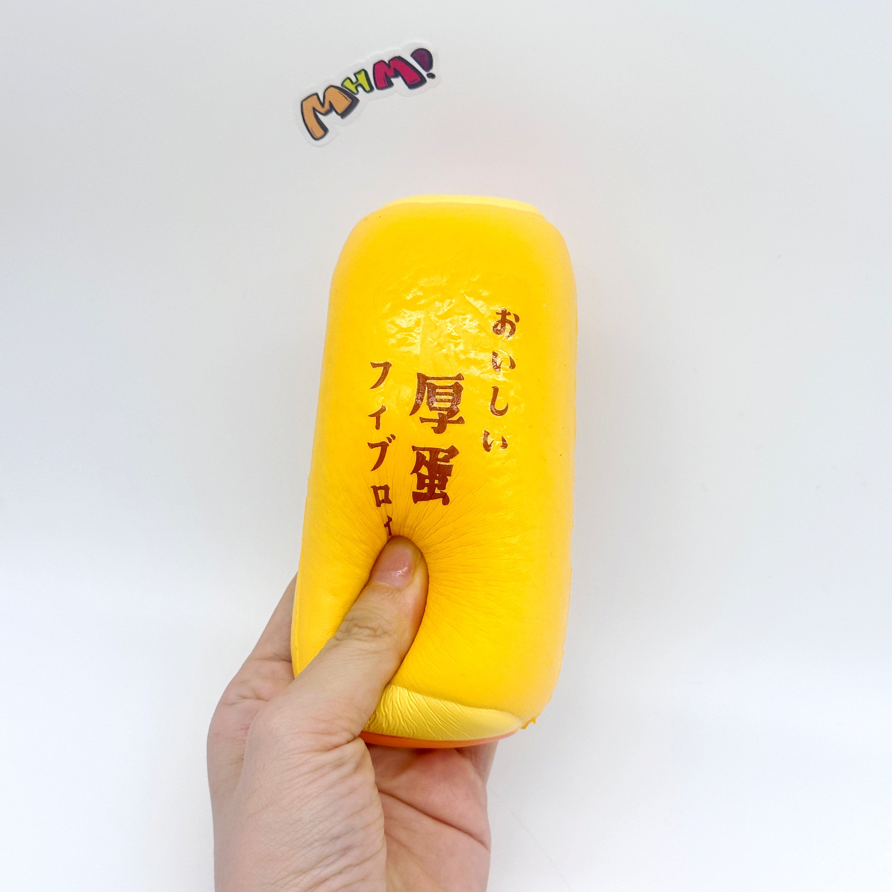 Tamagoyaki Squishy - Yellow & Chocolate Japanese Thick Egg Omelet - slow rise toy hand squeeze demo
