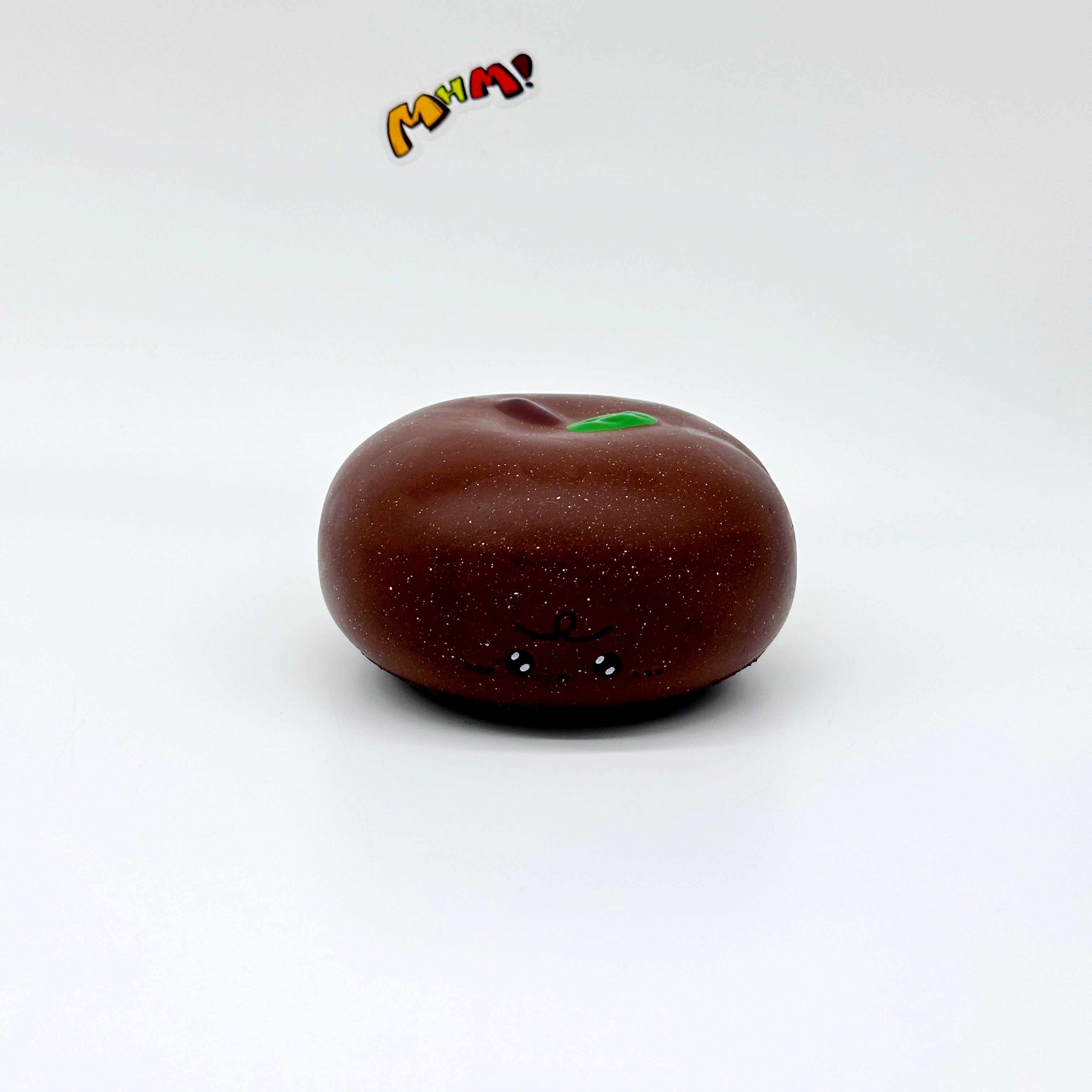 Apple Bread Squishy - Chocolate Brown & Milky White Slow Rising S - slow rising squeeze toy side angle view