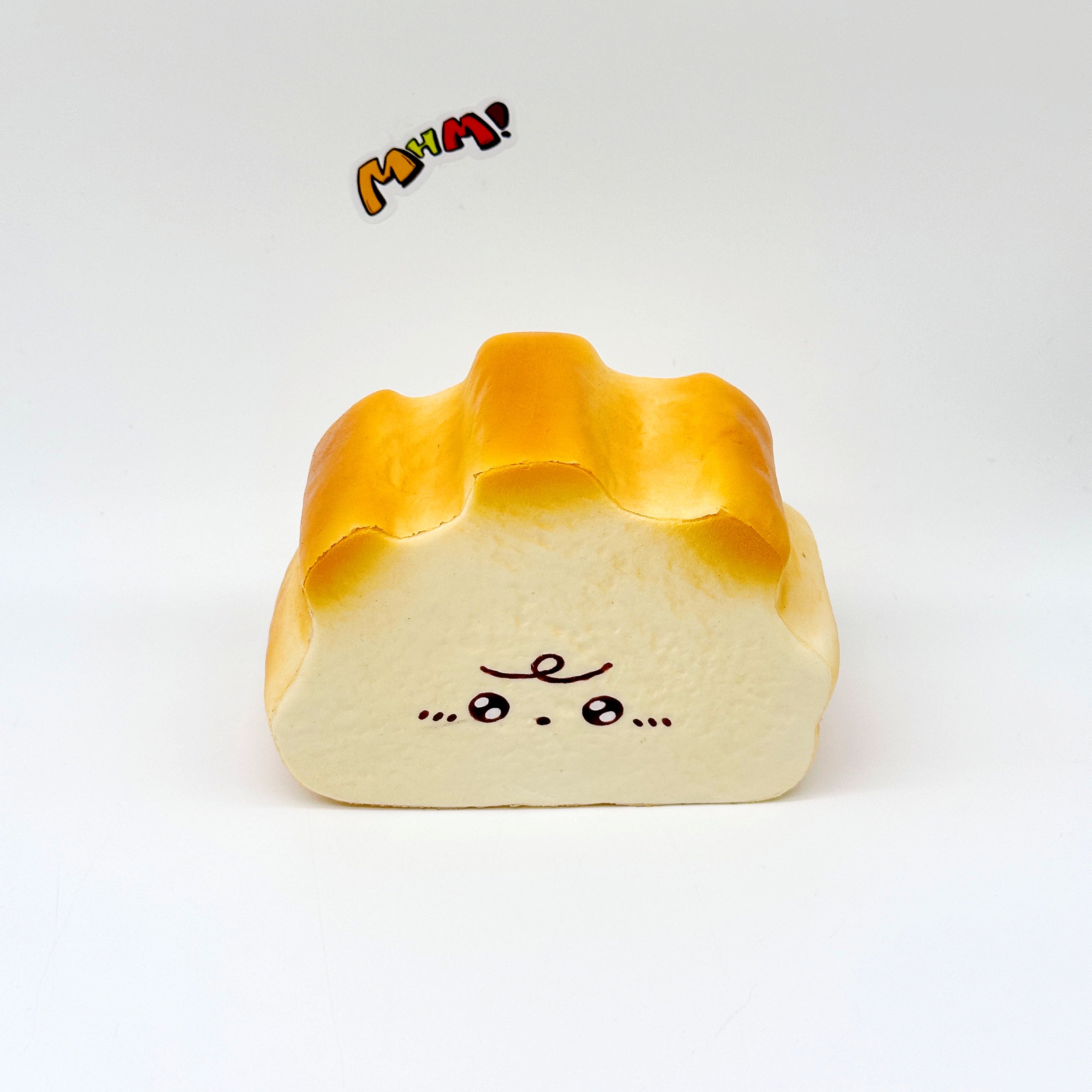Milk Haas Bread Squishy - Chocolate Brown & Original Bread Yellow - squishy stress relief toy detail shot