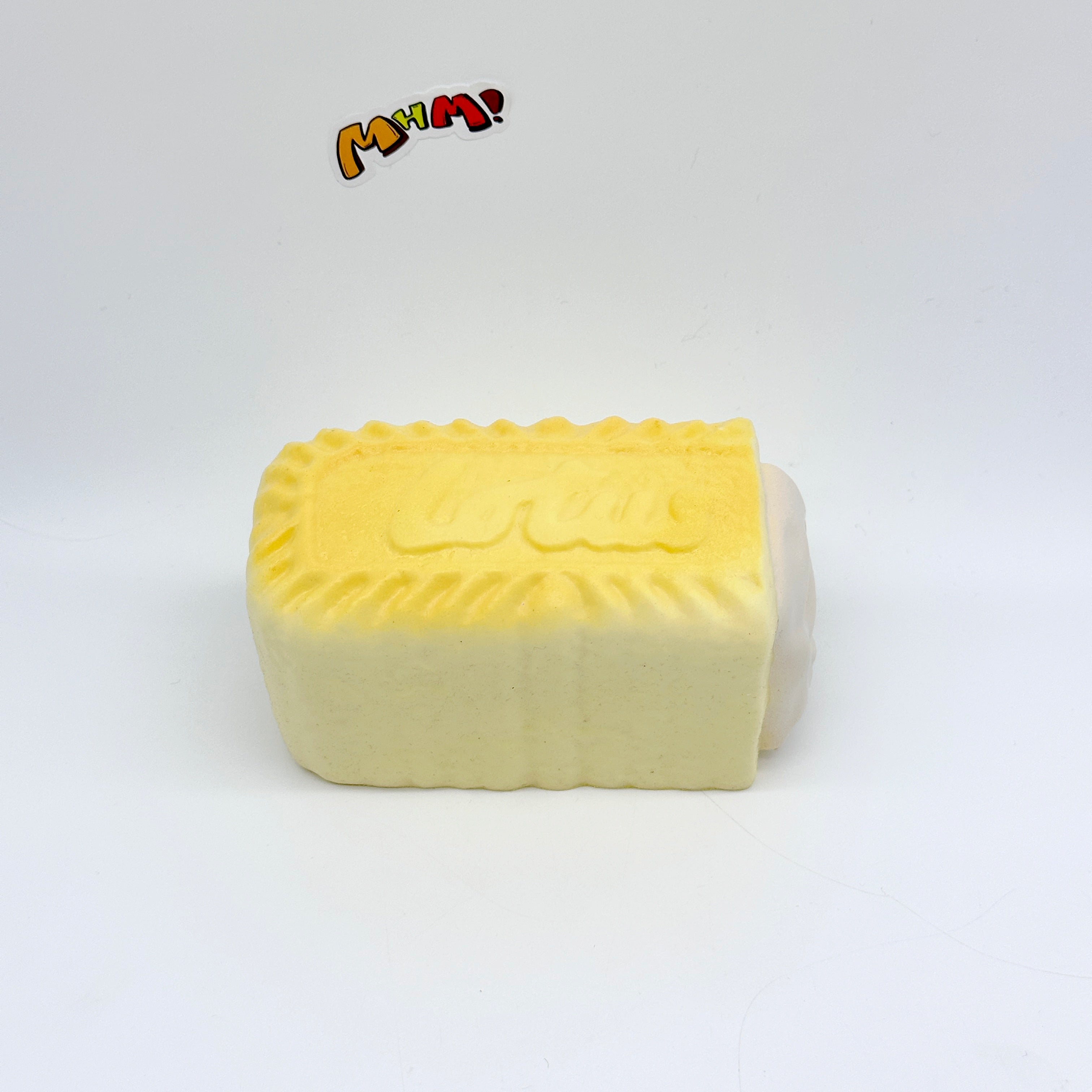 Thick Cream Filled Milk Biscuit Squishy | Snack Themed Slow Risin - soft slow rise fidget toy front view