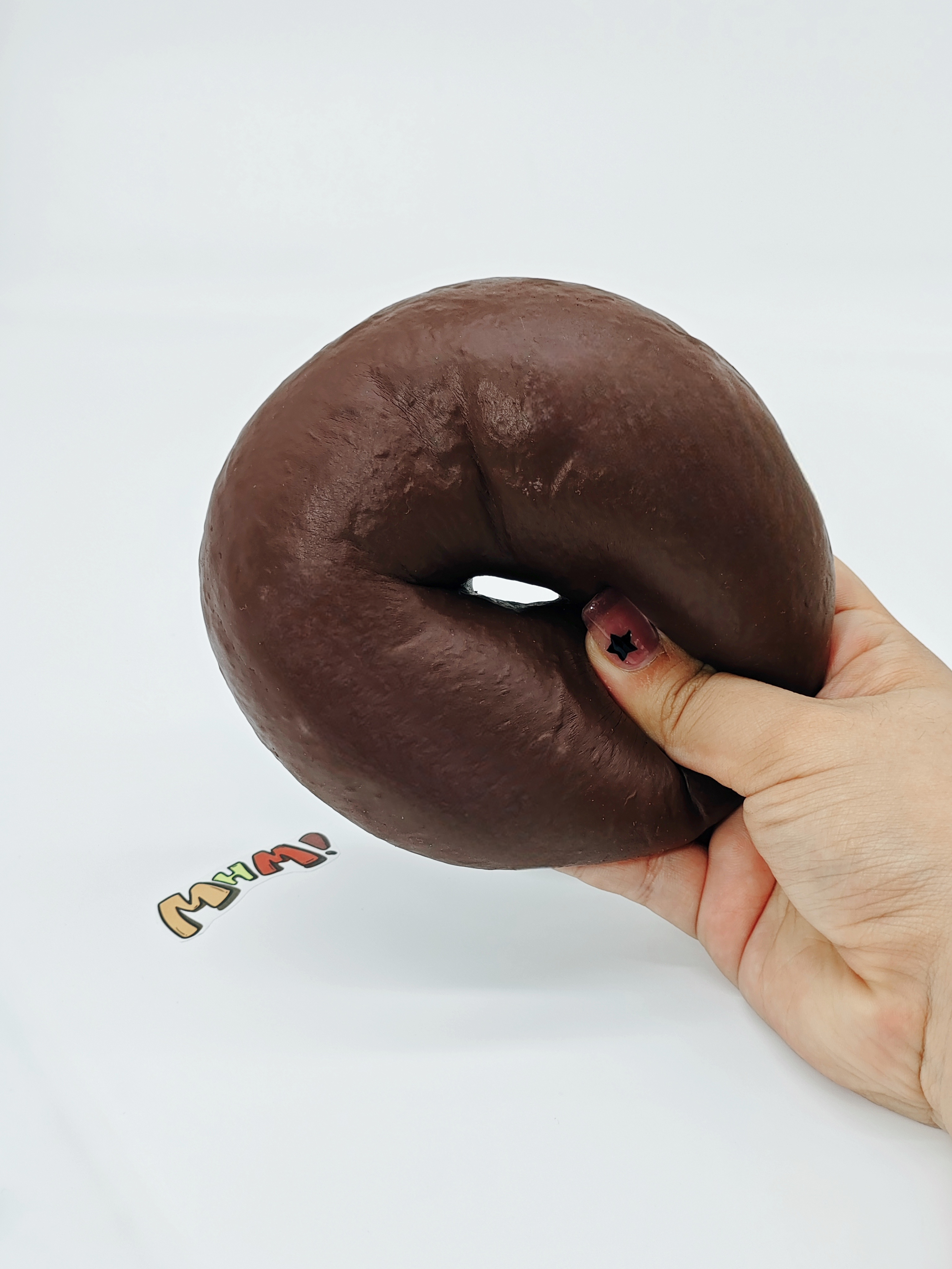 Chocolate Bagel Squishy | Bakery Themed Slow Rising Stress Relief - slow rising squeeze toy side angle view