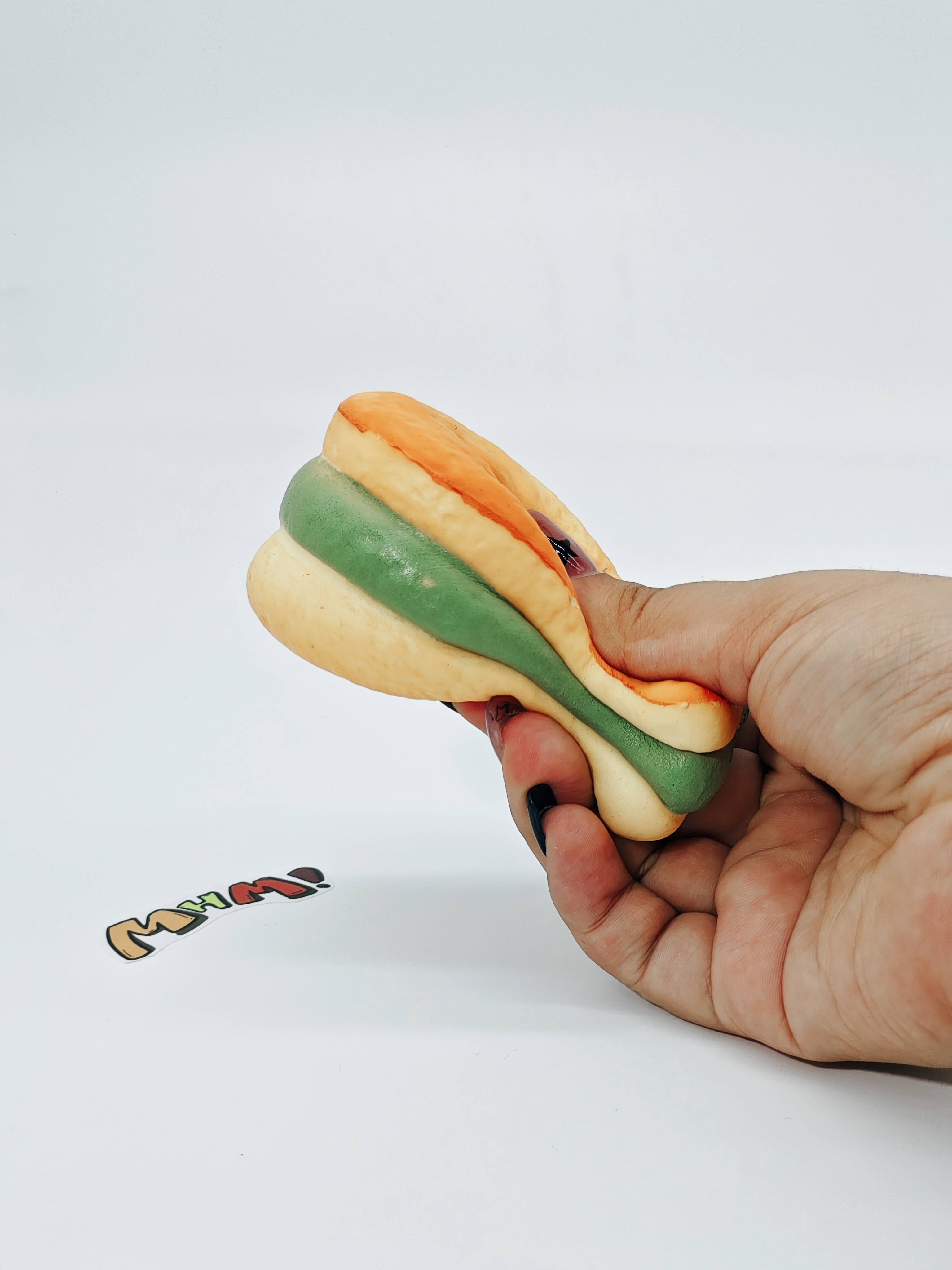 Matcha Filling Fish Cake Squishy | Snack Themed Slow Rising Stres - slow rising squeeze toy side angle view