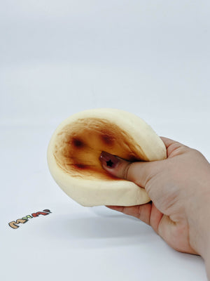Basque Cheesecake Squishy | Dessert Themed Slow Rising Stress Rel - squishy toy size reference with hand