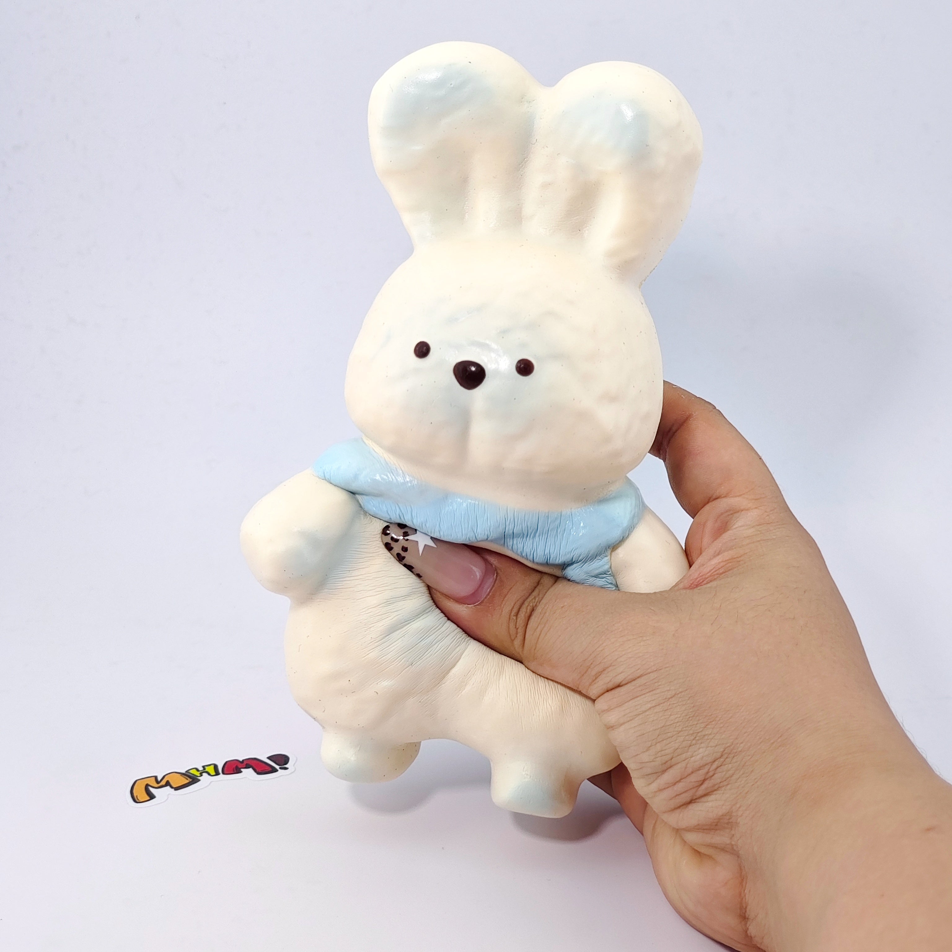 Blue Scarf Bunny Squishy | Cute Animal Themed Slow Rising Stress  - slow rising squeeze toy side angle view