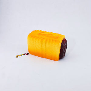 Dark Thick Filled Milk Biscuit Squishy | Snack Themed Slow Rising - soft slow rise fidget toy front view