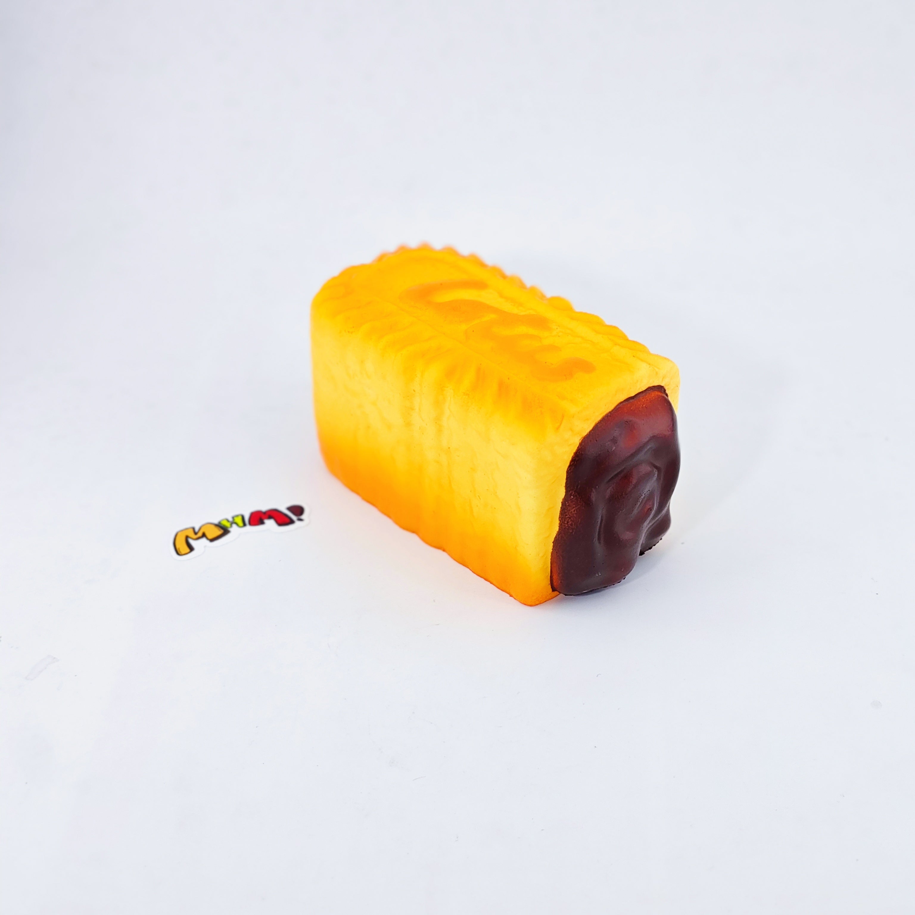 Dark Thick Filled Milk Biscuit Squishy | Snack Themed Slow Rising - squishy stress relief toy detail shot