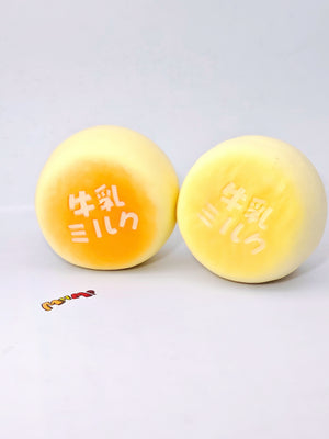 Soft Milk Bun Squishy | 3 Styles Dairy Bakery Themed Slow Rising  - squishy toy size reference with hand