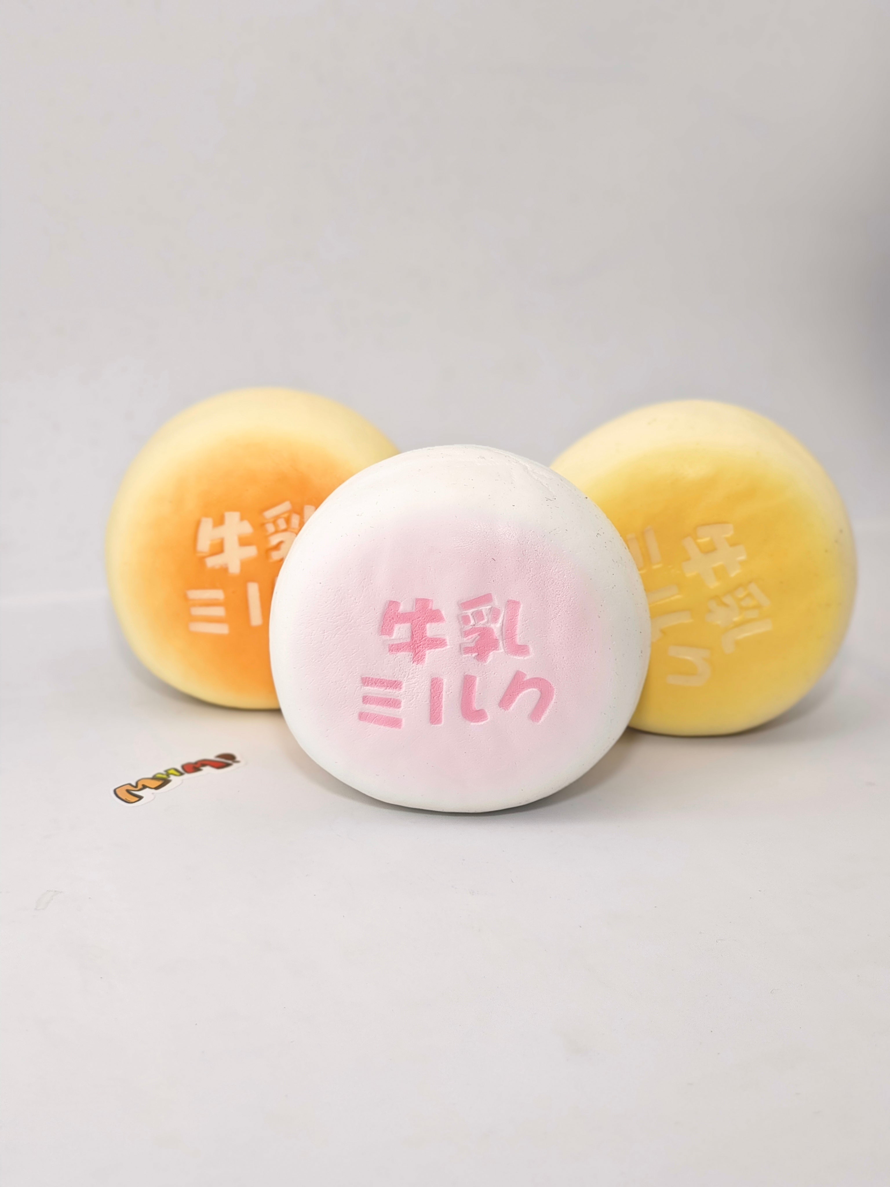 Soft Milk Bun Squishy | 3 Styles Dairy Bakery Themed Slow Rising  - slow rising squeeze toy side angle view